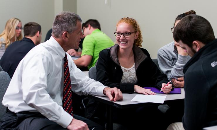 professor talking with students